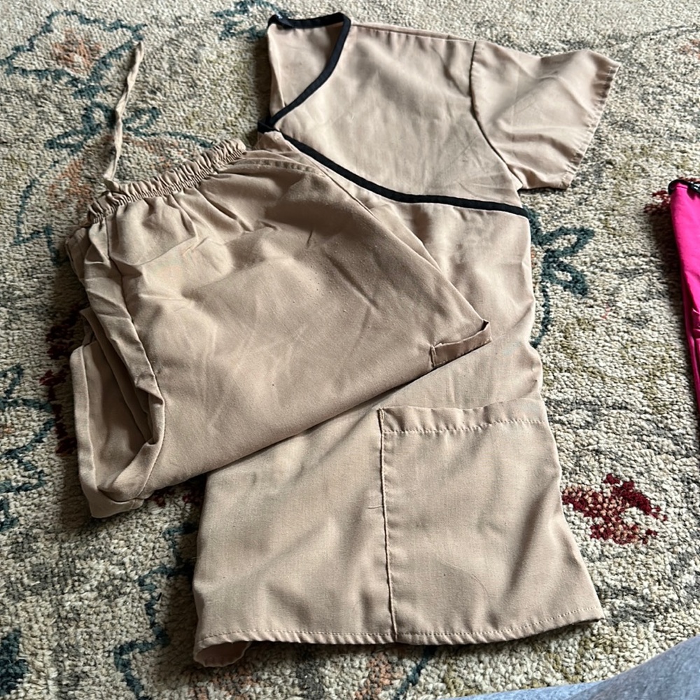Never worn Scrub set top and bottom size medium